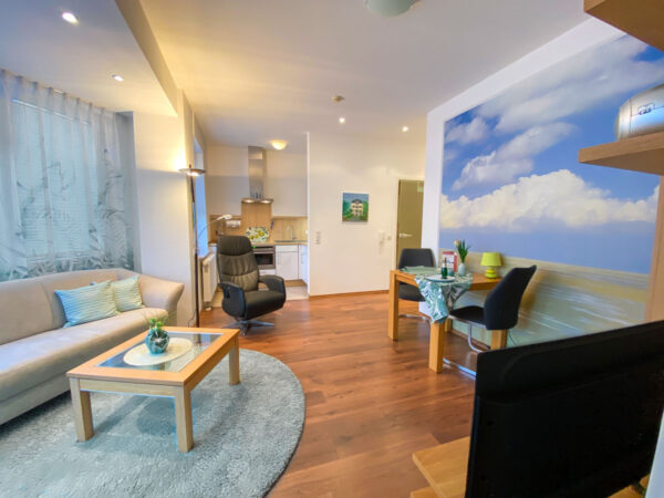 Wohnzimmer und Essbereich Ferienwohnung 4 Parkvilla Steins